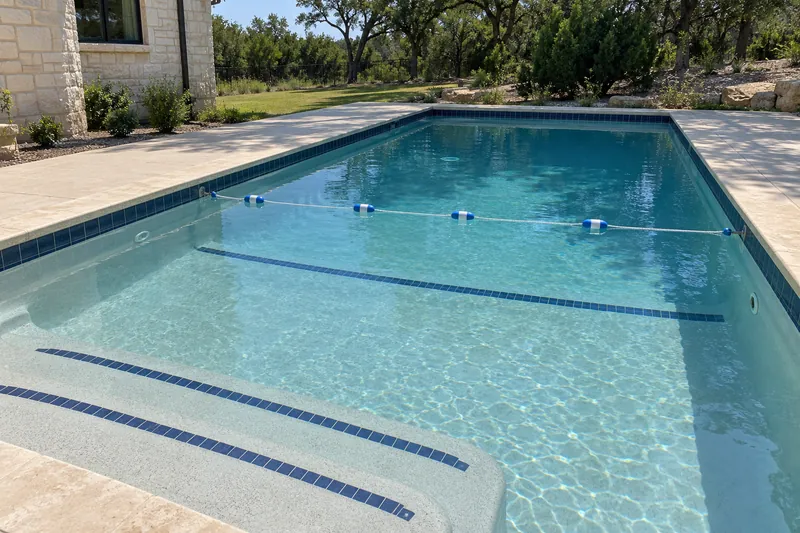 Rope and float line across a pool at the slope break